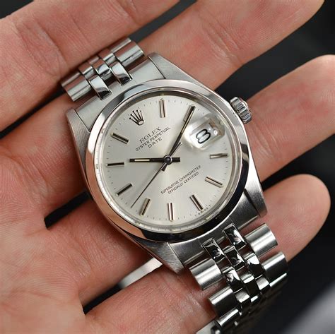 vintage rolex with suit|Rolex watch vintage price guide.